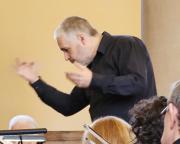 Robert Dick conducting the rehearsal